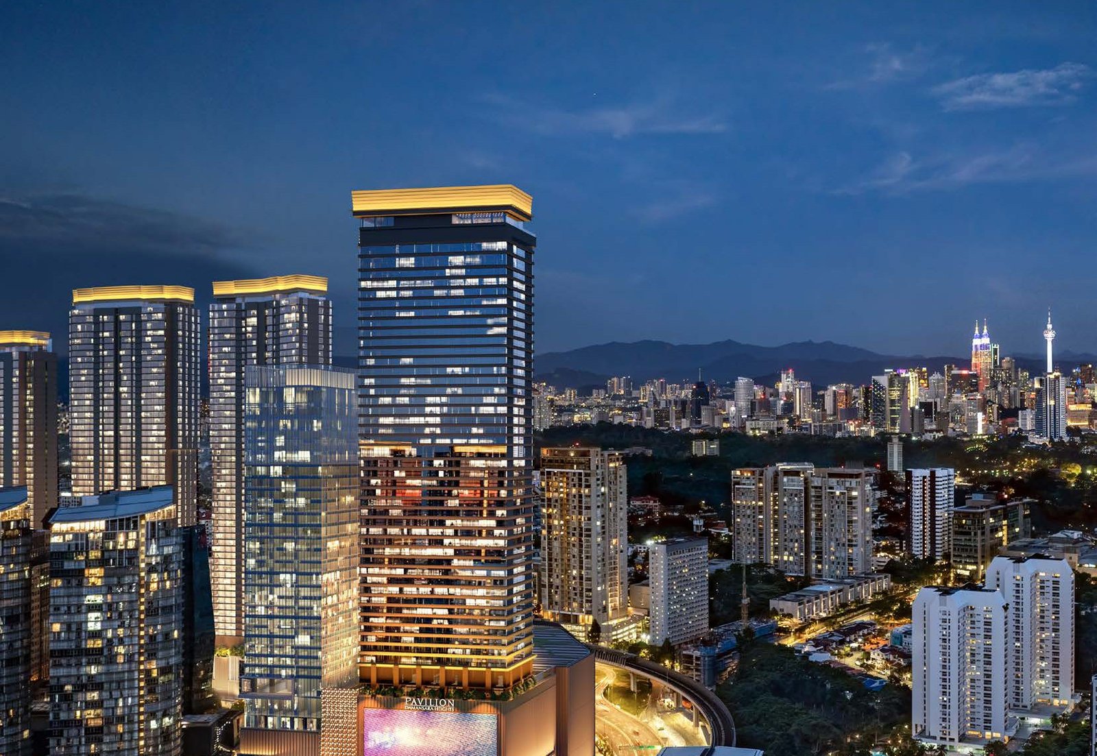 Royal Suites towers within the Pavilion Damansara Heights masterplan at dusk