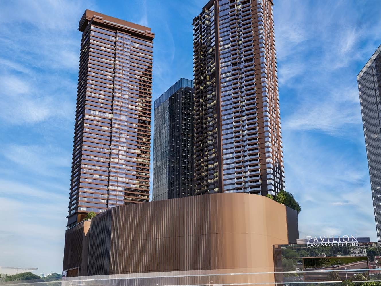 Royal Suites towers above Pavilion Damansara Heights mall and MRT station